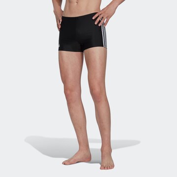 ADIDAS PERFORMANCE Athletic Swim Trunks in Black: front