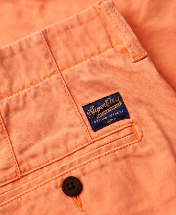 Regular Pantalon chino Superdry en orange