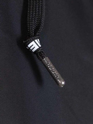 ALPHA INDUSTRIES Between-Season Jacket 'MA-1 ZHP' in Black