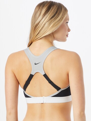NIKE Bustier Sport-BH in Schwarz