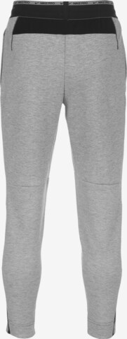 NIKE Tapered Sportbroek in Grijs