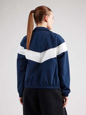 Nike SportswearPrijelazna jakna - plava boja