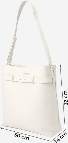 Calvin Klein Taška přes rameno – béžová