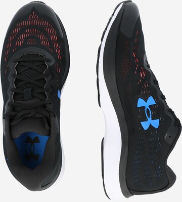 UNDER ARMOUR Juoksukengät 'Charged Bandit 6' värissä musta