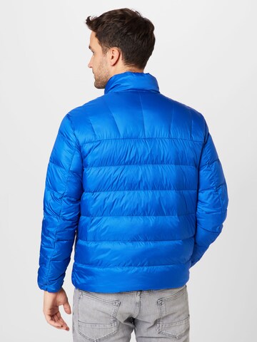Tommy Jeans Prehodna jakna | modra barva