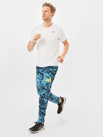 ADIDAS PERFORMANCE - Tapered Pantalón deportivo en azul