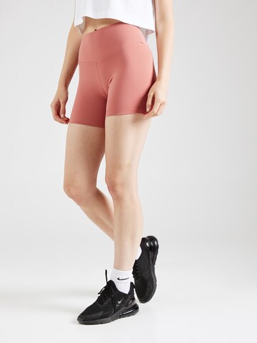 Skinny Pantaloni sportivi 'ONE' di NIKE in rosa: frontale