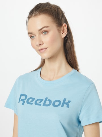 Reebok Funkční tričko – modrá