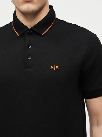 ARMANI EXCHANGE Poloshirt in Schwarz