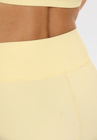 Athlecia Slim fit Sports trousers 'Blossom' in Yellow