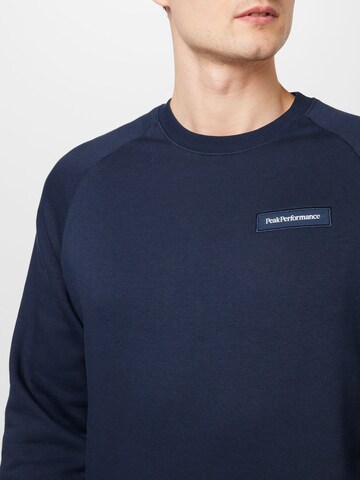 PEAK PERFORMANCE Sportsweatshirt in Blauw