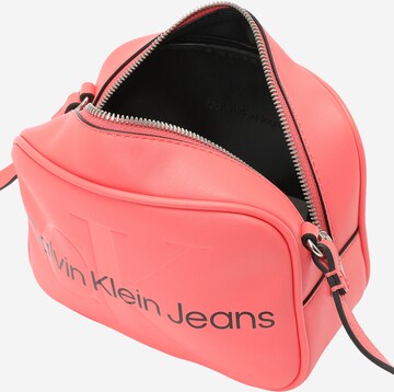 Calvin Klein Jeans Сумка через плечо в Ярко-розовый