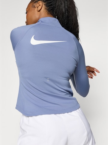 NIKE Sportief sweatshirt 'TEMPO SWSH HBR' in Blauw