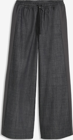 PUMA Wide leg Pants 'POWERPUFF' in Black: front