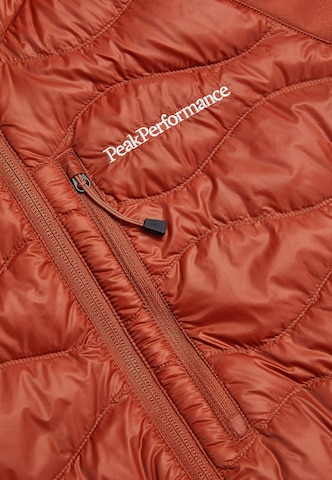 PEAK PERFORMANCE Between-Season Jacket 'Helium' in Orange