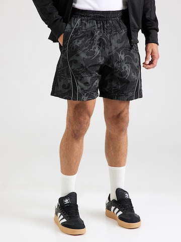 ADIDAS ORIGINALS Loosefit Byxa 'ADILENIUM' i svart: framsida
