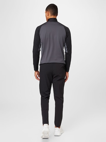 Reebok Regular Sports trousers in Black