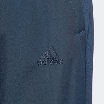 Effilé Pantalon de sport 'All SZN' ADIDAS SPORTSWEAR en bleu