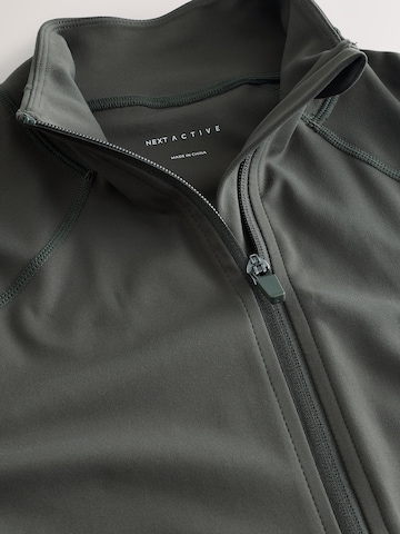 Next - Chaqueta de entretiempo 'Active Balance' en verde