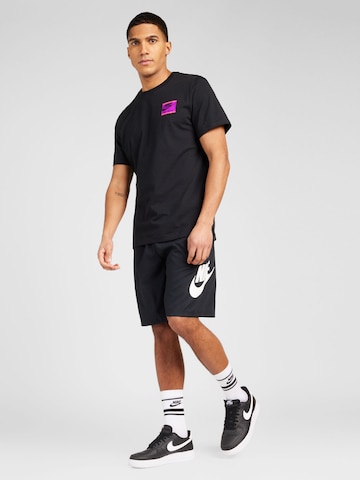 Nike Sportswear Loosefit Παντελόνι 'CLUB' σε μαύρο
