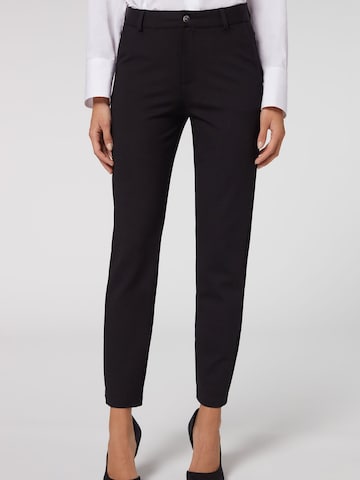 CALZEDONIA Slim fit Pants in Black: front