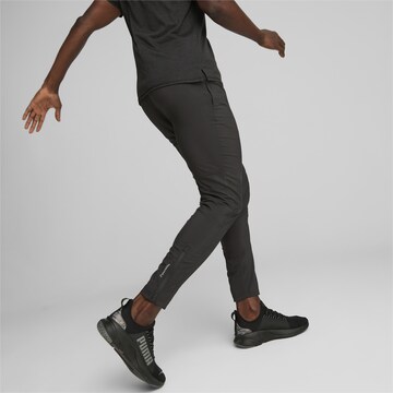 PUMA Tapered Weatherproof pants in Black