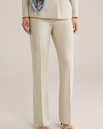 WE Fashion Laienev Viikidega püksid, värv beež: eest vaates