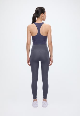 PUMASkinny Sportske hlače 'CLOUDSPUN' - plava boja: stražnji dio