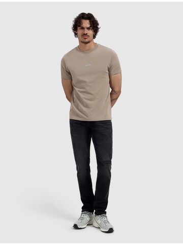 Pure Path Tapered Jeans in Grey: front