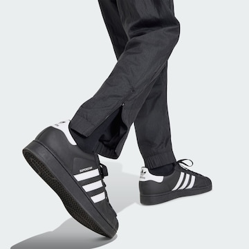 ADIDAS PERFORMANCE Tapered Sportbroek 'Manchester United 90' in Zwart