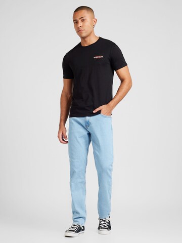 Maglietta 'American Tradition' di GUESS JEANS in nero