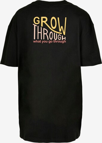 T-shirt 'Spring - Grow Through' Merchcode en noir