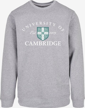 Merchcode Sweatshirt 'University Of Cambridge - Est 1209' in Grau: predná strana