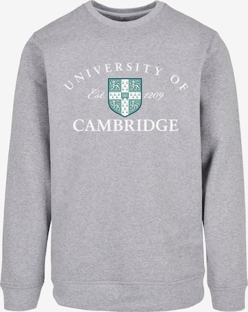 Merchcode Sweatshirt 'University Of Cambridge - Est 1209' in Grau: predná strana