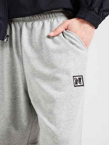 NIKE Tapered Παντελόνι φόρμας 'HERITAGE' σε γκρι