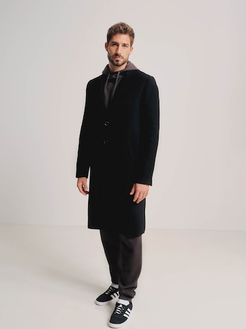 ABOUT YOU x Kevin Trapp Between-Seasons Coat 'Julian' in Black