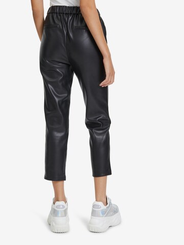 Regular Pantalon Cartoon en noir