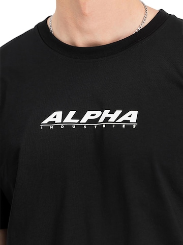 ALPHA INDUSTRIES T-shirt 'Rubber' i svart