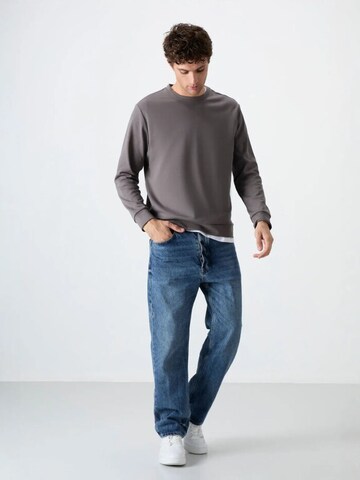 Felpa di Tommy Life in grigio
