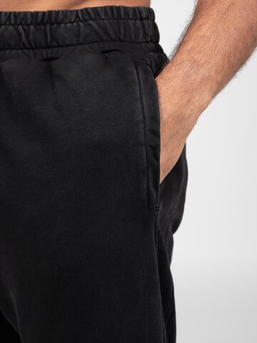 Loosefit Pantaloni sportivi 'Curtis' di Gorilla Wear in nero