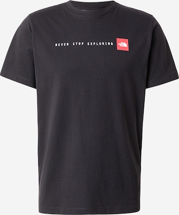 THE NORTH FACE Paita 'NEVER STOP EXPLORING' värissä musta: etupuoli