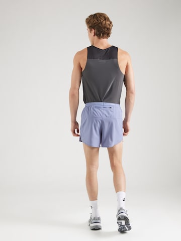 NIKE Regular Sportbroek in Blauw