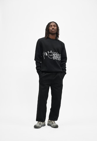 Cleptomanicx Sweater 'FUHUMANS' in Black