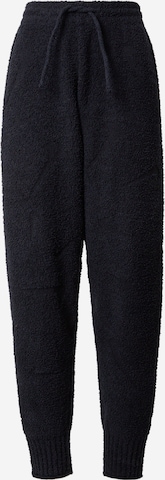 juoda Nike Sportswear Siaurėjantis Kelnės 'Phoenix': priekis