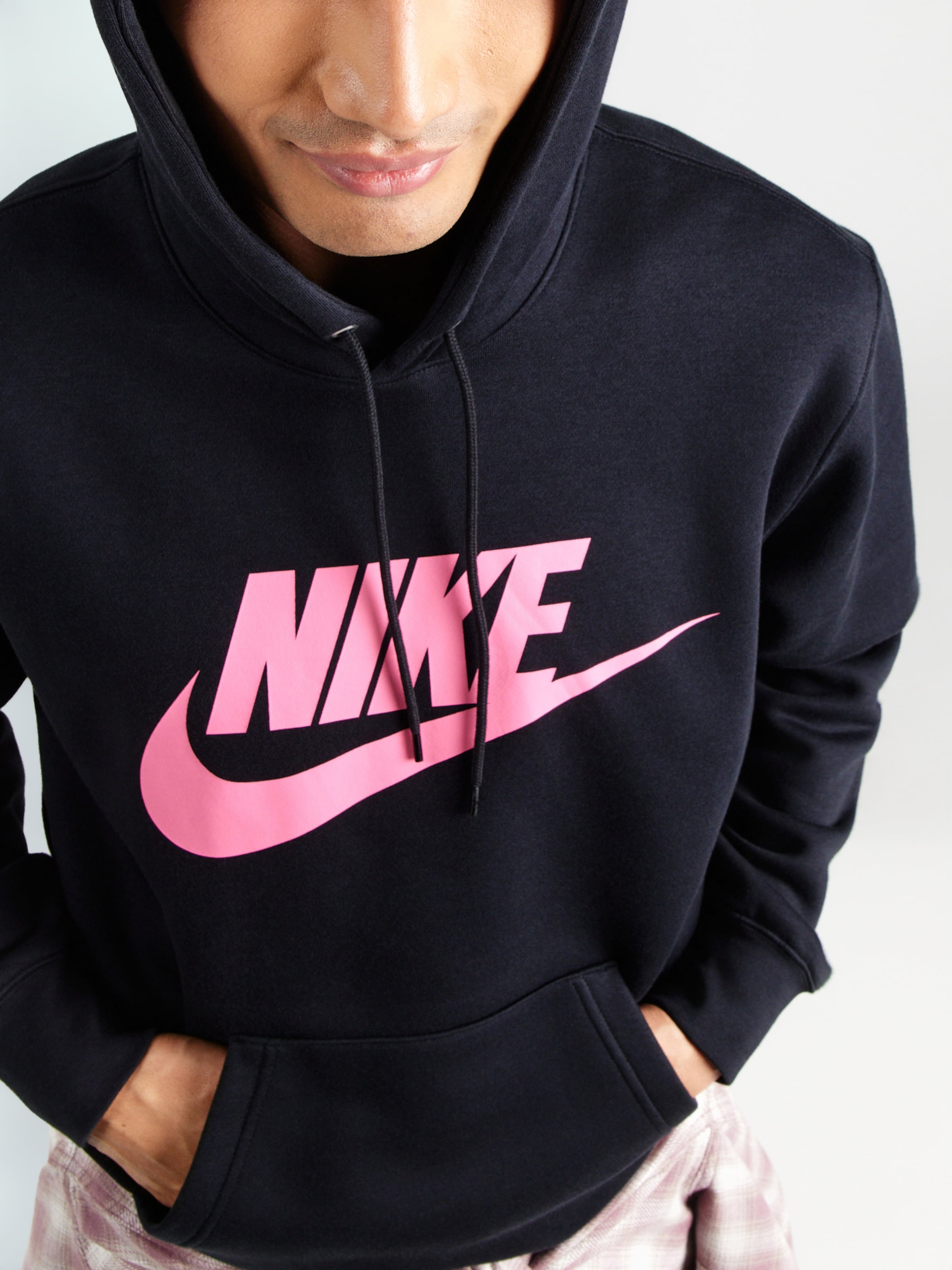pink and black nike sweater