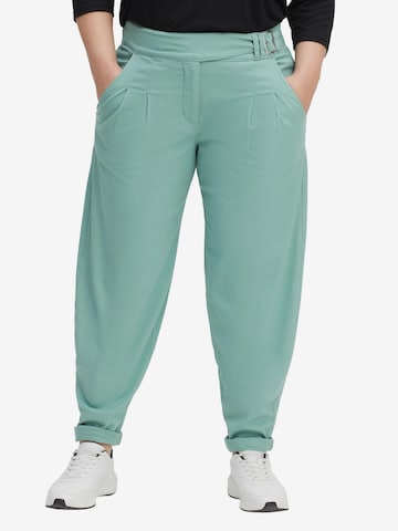 SHEEGO Tapered Pleat-Front Pants in Green: front