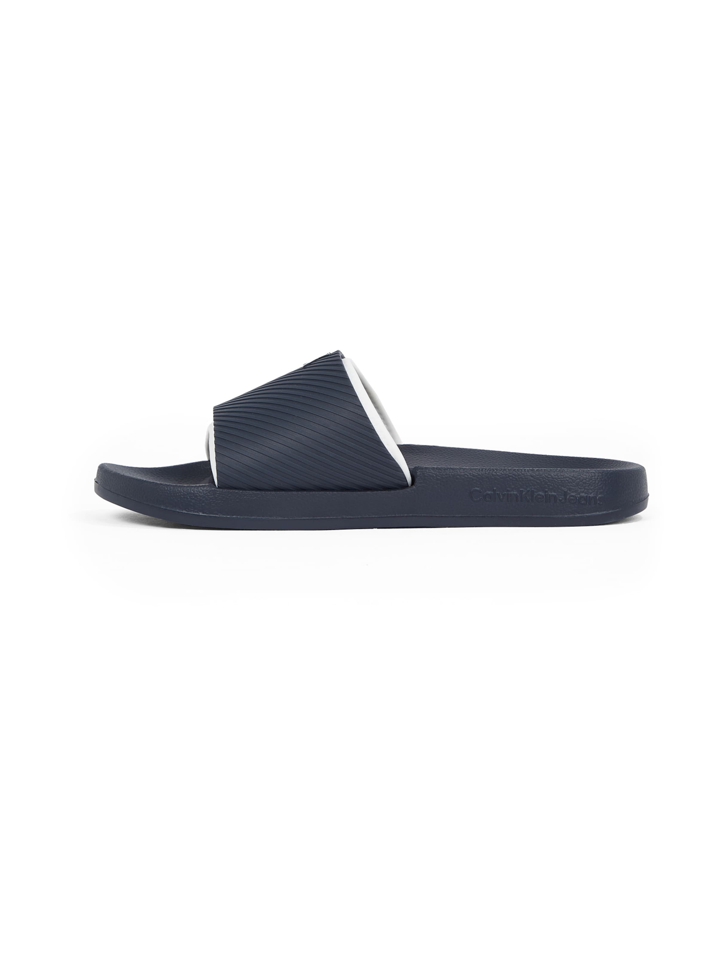 Saboți de la Calvin Klein pe albastru: față