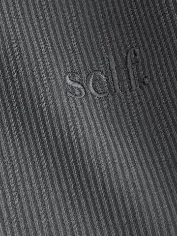 Wide leg Pantaloni di self. in grigio