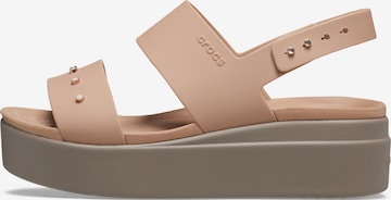 Crocs Sandalen met riem in Beige: voorkant