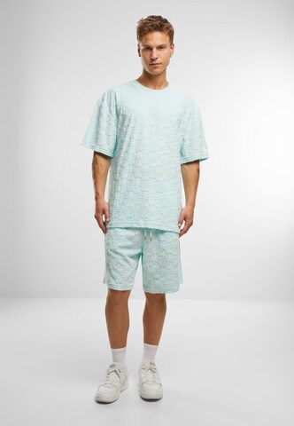 Loosefit Pantalon Karl Kani en vert